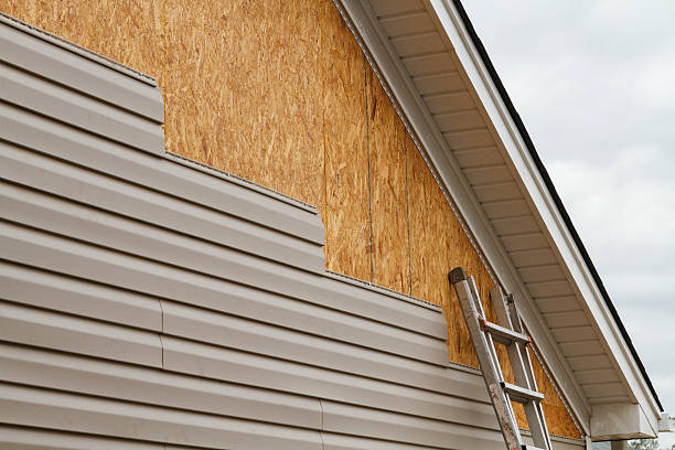 Professional Siding Contractor technician working in Floral Park, NY